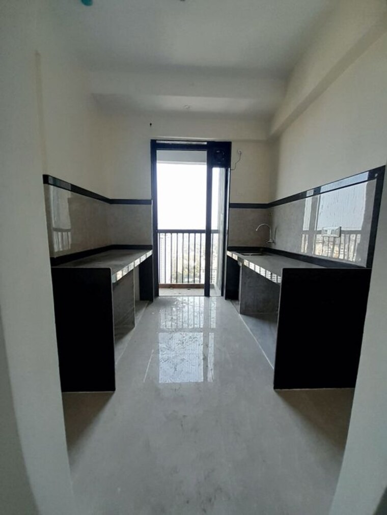 Kitchen, dhamji-shamji-mahavir-spring-tulip-phase-1 2 Bedroom 716 Sq.Ft. Apartment In Pokhran Road No Two Thane 10517949