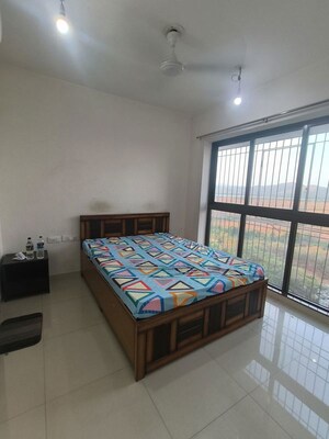 Bedroom in 2 BHK Apartment at Lodha Splendora River View, Ghodbunder Road – for Rent