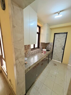 Kitchen in 2 BHK Apartment at Apex Our Homes, Sector 37c – for Rent