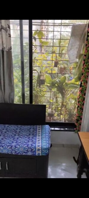Living Room in 1 BHK Apartment at Bindra Sateri Legacy, Andheri East – for Rent