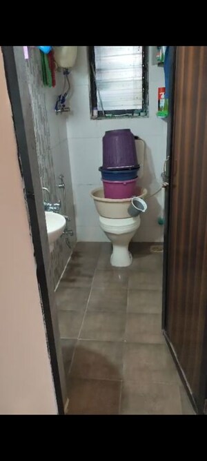 Bathroom in 1 BHK Apartment at Bindra Sateri Legacy, Andheri East – for Rent
