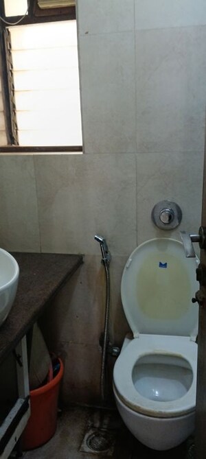 Bathroom in 2 BHK Apartment at Oshiwara Mhada, Andheri West – for Rent
