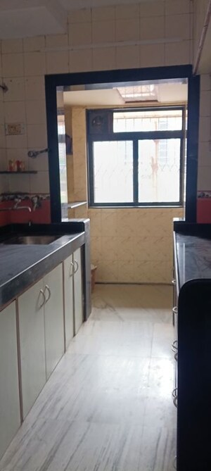 Kitchen in 2 BHK Apartment at Oshiwara Mhada, Andheri West – for Rent