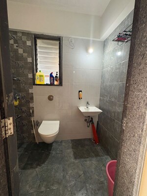 Bathroom in 2 BHK Apartment at Abrol Avirahi Heights, Malad West – for Sale