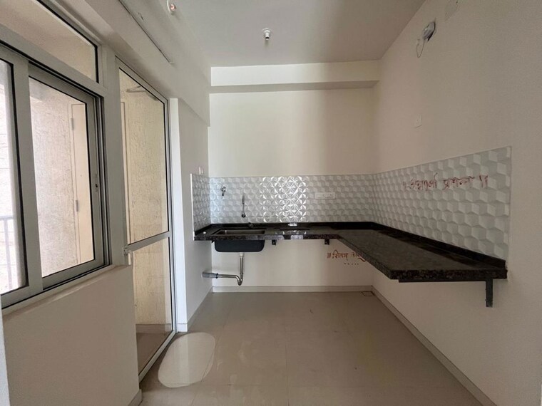Kitchen, godrej-green-cove 2 Bedroom 850 Sq.Ft. Apartment In Mahalunge Pune 10518207