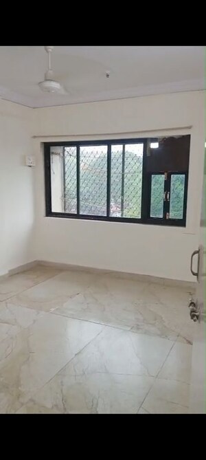 Room in 2 BHK Apartment at Mahakali CHS, Andheri East – for Rent