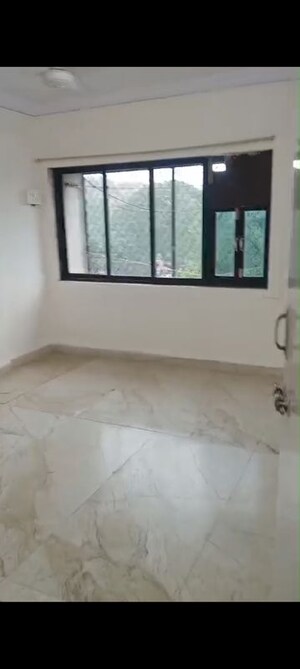Room in 2 BHK Apartment at Mahakali CHS, Andheri East – for Rent