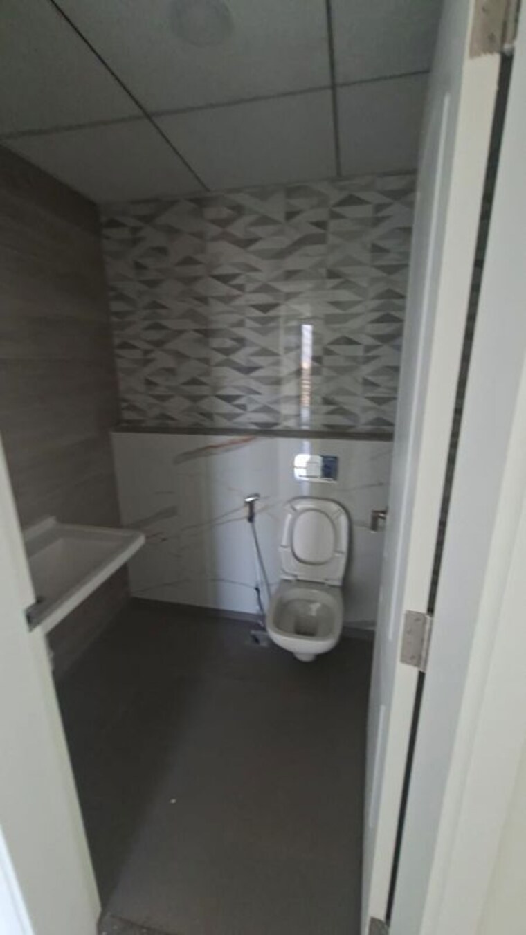 Bathroom, kumar-47-east-a 2 Bedroom 850 Sq.Ft. Apartment In Magarpatta City Pune 10518261