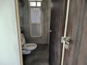 Bathroom in 2 BHK Apartment at Abhinav Pebbles Urbania, Bavdhan – for Rent