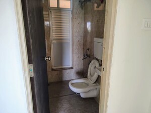 Bathroom in 2 BHK Apartment at Abhinav Pebbles Urbania, Bavdhan – for Rent