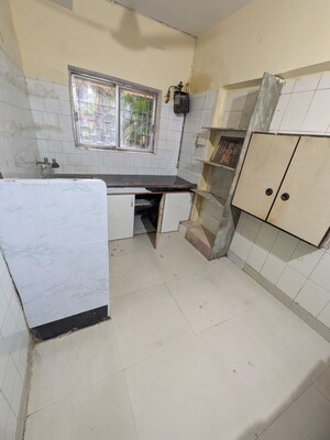 Kitchen in 1 BHK Apartment at Sameepan CHS, Satya Nagar – for Rent