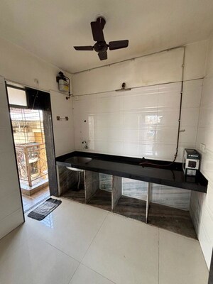 Kitchen in 2 BHK Apartment at Steel City Elite, Ulwe – for Rent