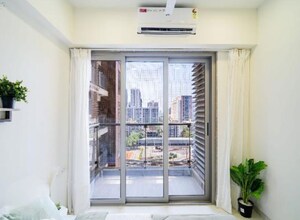 Living Room in 1 BHK Apartment at Hiranandani Regent Hill, Powai – for Rent