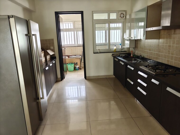 Kitchen, brigade-caladium 4 Bedroom 4210 Sq.Ft. Apartment In Hebbal Bangalore 10518719