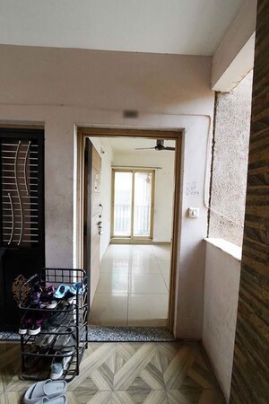 Building Lobby in 2 BHK Apartment at Sargasan – for Sale