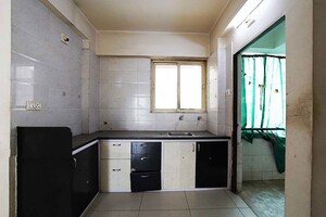 Kitchen in 2 BHK Apartment at Sargasan – for Sale