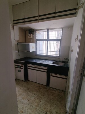 Kitchen in 1 BHK Apartment at New Tulip CHS, Kandivali East – for Rent