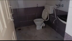 Bathroom in 2 BHK Apartment at Grah Avas Green View Heights, Raj Nagar Extension – for Sale