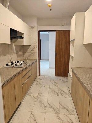 Kitchen in 3 BHK Apartment at Godrej Vrikshya, Sector 103 – for Sale