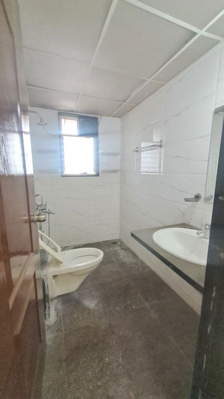 Bathroom, nirmaan-aasamant-phase-i 2 Bedroom 1200 Sq.Ft. Apartment In Kondhwa Budruk Pune 10519034