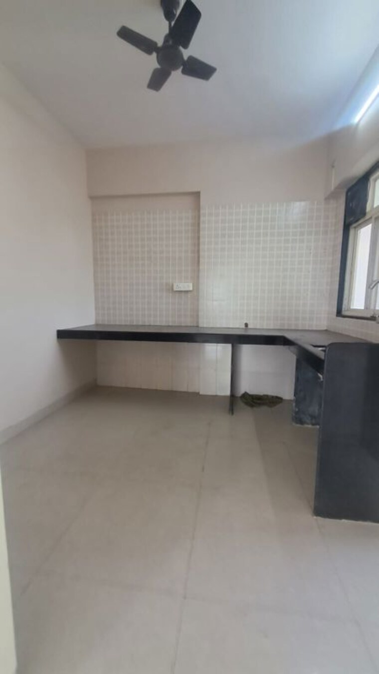 Kitchen, nirmaan-aasamant-phase-i 2 Bedroom 1200 Sq.Ft. Apartment In Kondhwa Budruk Pune 10519034