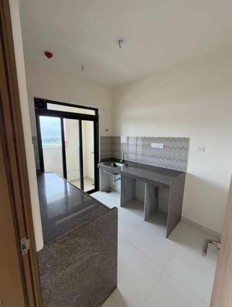 Kitchen, lodha-casa-supremo 2 Bedroom 780 Sq.Ft. Apartment In Mira Road East Thane 10519083
