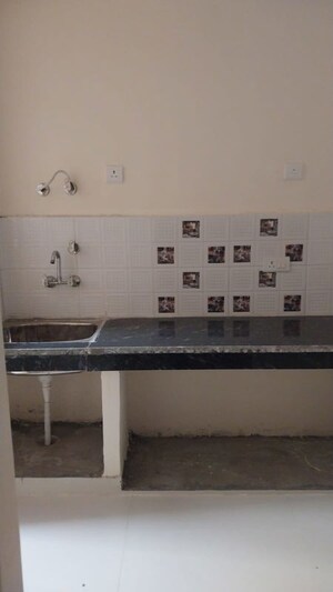 Kitchen in 2 BHK Apartment at Mehak Jeevan, Raj Nagar Extension – for Sale
