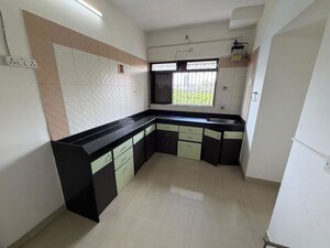 Kitchen in 2 BHK Independent House at Cosmos Heritage, Manpada – for Rent
