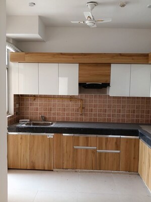 Kitchen in 2 BHK Apartment at Mahagun Mywoods, Sector 16c Greater Noida – for Rent