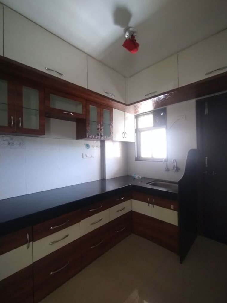 Kitchen, supertech-defence-colony-phase-l 3 Bedroom 1486 Sq.Ft. Apartment In Wagholi Pune 10519378