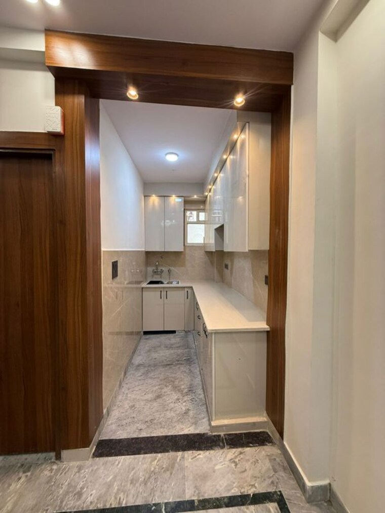 Kitchen, t-homes-phase-1 3 Bedroom 1350 Sq.Ft. Apartment In Siddharth Vihar Ghaziabad 10519390