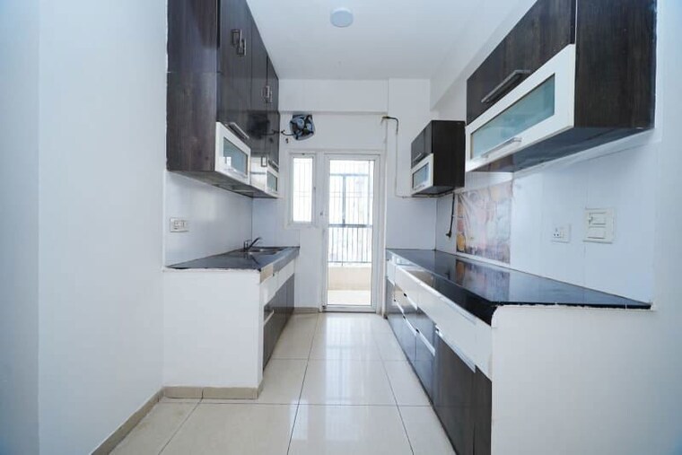Kitchen, homes-121 2 Bedroom 945 Sq.Ft. Apartment In Sector 121 Noida 10519431