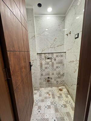 Bathroom in 2 BHK Builder Floor at Dwarka Mor – for Sale