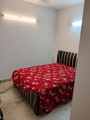 Bedroom in 2 BHK Builder Floor at Kalkaji – for Rent