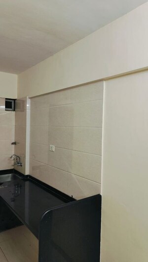 Kitchen in 2 BHK Apartment at Wakad – for Sale