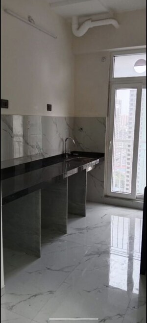 Kitchen in 1 BHK Apartment at Ruparel Sky Green, Kandivali West – for Rent
