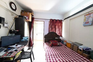 Bedroom in 1 BHK Apartment at Wadgaon Sheri – for Sale