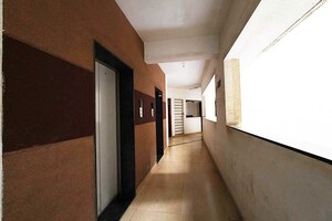 Building Lobby in 1 BHK Apartment at Wadgaon Sheri – for Sale