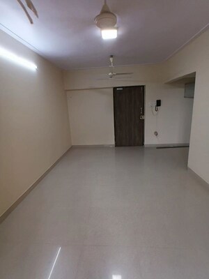 Room in 2 BHK Apartment at Lokhandwala Whispering Palms, Kandivali East – for Rent