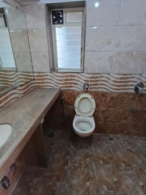 Bathroom in 2 BHK Apartment at Lokhandwala Whispering Palms, Kandivali East – for Rent