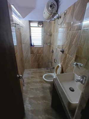 Bathroom in 2 BHK Apartment at Lokhandwala Whispering Palms, Kandivali East – for Rent