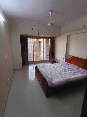 Bedroom in 2 BHK Apartment at Lokhandwala Whispering Palms, Kandivali East – for Rent