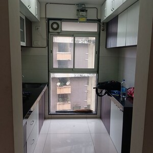 Kitchen in 2 BHK Apartment at Godrej Tranquil, Kandivali East – for Rent