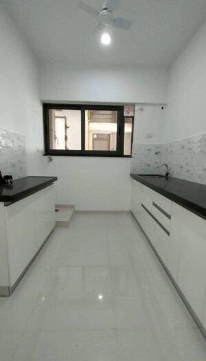 Kitchen in 2 BHK Apartment at Amanora Gold Towers, Hadapsar – for Sale