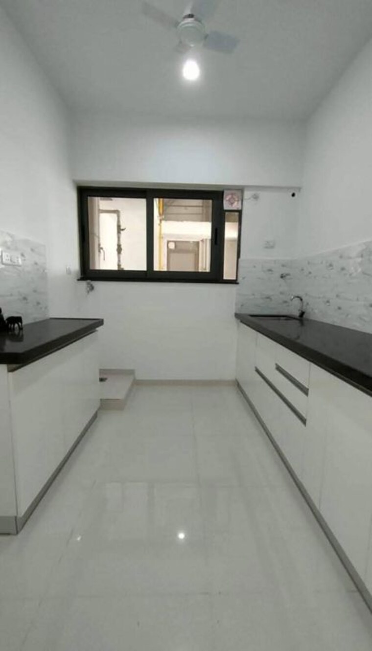 Kitchen, amanora-gold-towers 2 Bedroom 980 Sq.Ft. Apartment In Hadapsar Pune 10519635