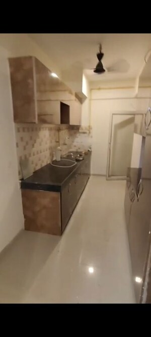 Kitchen in 2 BHK Apartment at Wave Dream Homes, Wave City – for Rent