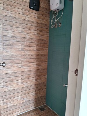Bathroom in 1 BHK Apartment at Lodha Crown Quality Homes, Majiwada – for Rent