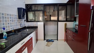 Kitchen in 2 BHK Apartment at Nanded City Pancham, Nanded – for Rent