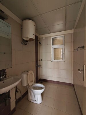 Bathroom in 2.5 BHK Apartment at Mahindra Aura, Sector 110a – for Sale