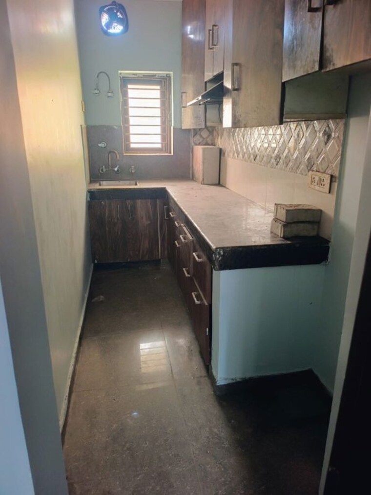 Kitchen, spring-field 2 Bedroom 125 Sq.Ft. Builder Floor In Sector 31 Faridabad 10519823